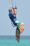 jumping kite surfer