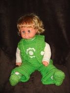 Blonde girl with the blue eyes as a doll