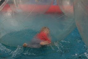 child is playing water polo