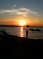 girl silhouette on the background of a romantic sunset