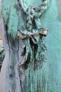 bronze statue with braids close up