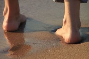 barefoot girl on the beach