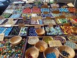 colorful glass marbles on the market