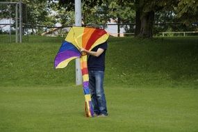 colored kite in the hands