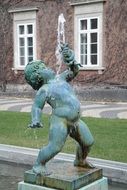 fountain and sculpture of a boy