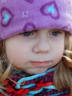 sad child girl face close up