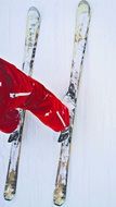 skis on a white snow
