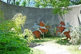 middle ages knights statue in garden