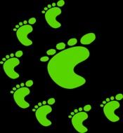 Green different traces of human feet on a black background