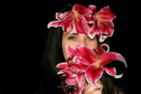 portrait of a green-eyed girl with a flower lily