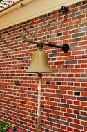 wall with decorative bell