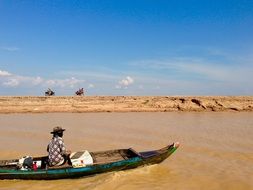 Boat in the river near the shore