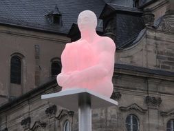 pink luminous statue of a man in Bamberg, Germany