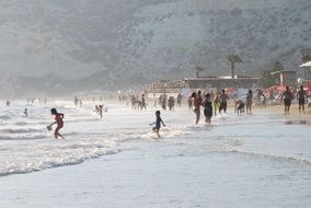 Photo of resting people on the mediterranean