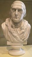 stone bust of a historical figure in a museum