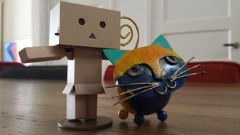 stick man and cat figures