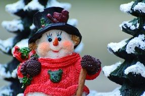 toy snowman in a red sweater