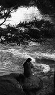 water girl resting black and white photo