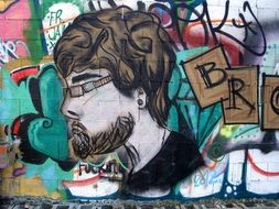 graffiti in the form of a face of a man with a beard