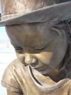 child girl, bronze sculpture