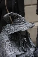 witch, living statue, street artist