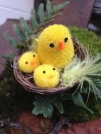 decorative easter chickens in a basket