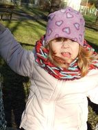 photo of a girl in a purple hat