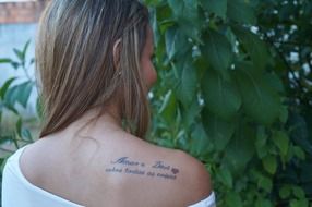 tattoo on the shoulder of a girl