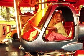 girl on amusement ride