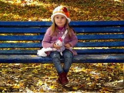 blond girl on the bank