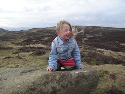 girl sitting windy benarty hill