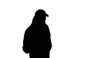 silhouette of a man in a cap