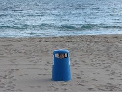 trash tank on the beach