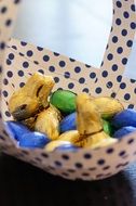 chocolate candy in a basket with polka dots