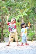 Thai children play with weapons