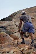 the shepherd climbs the cliff