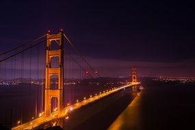 golden gate in lights in san francisco at night