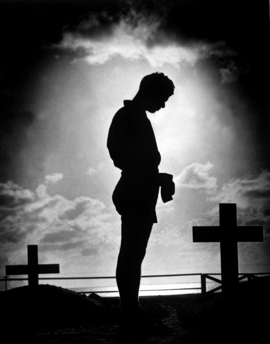 soldier over the graves in 1944