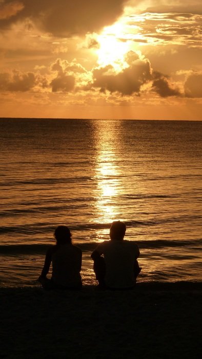 silhouette of a couple at sunset