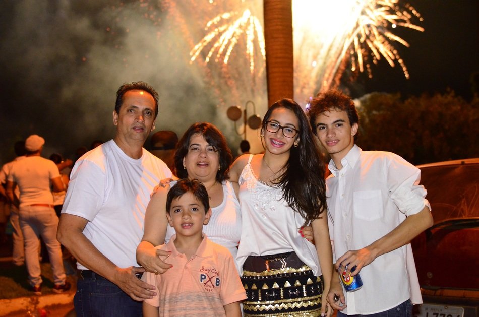 beautiful family at background with fireworks