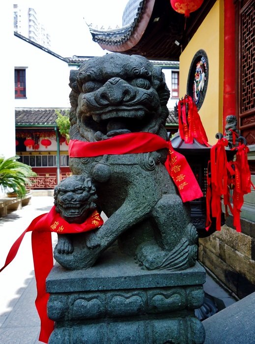 sculpture of a lion with a lion cub