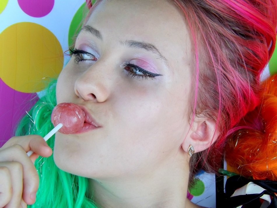 portrait of teenager with candy
