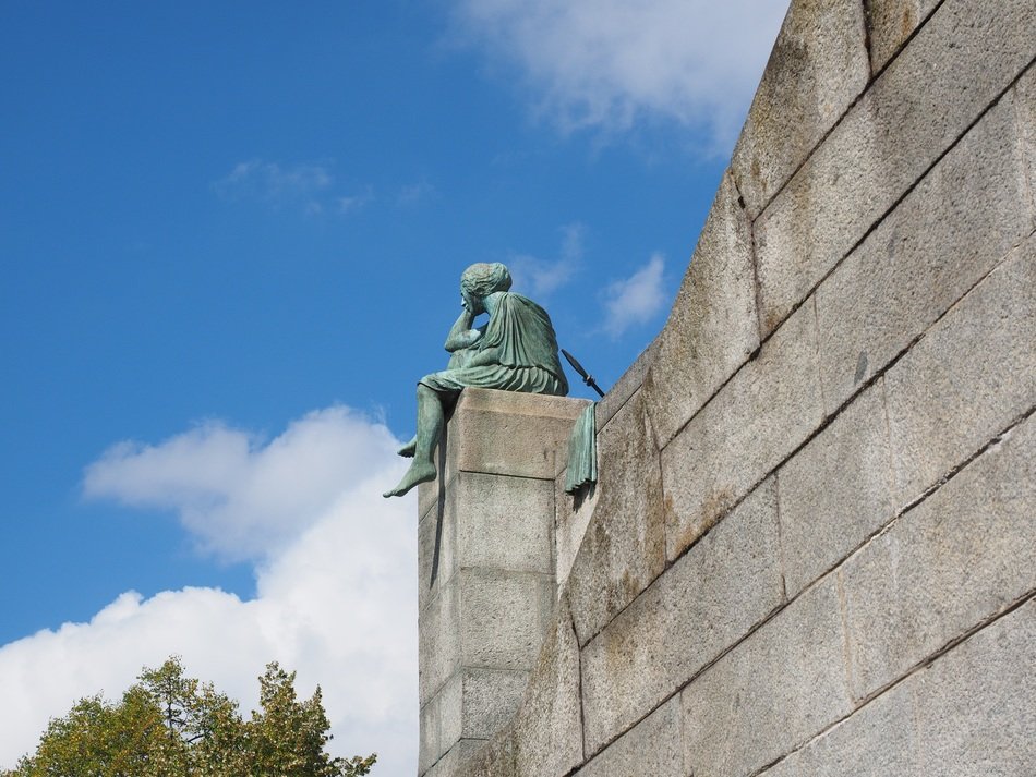 sculpture of a woman on the wall in Basel