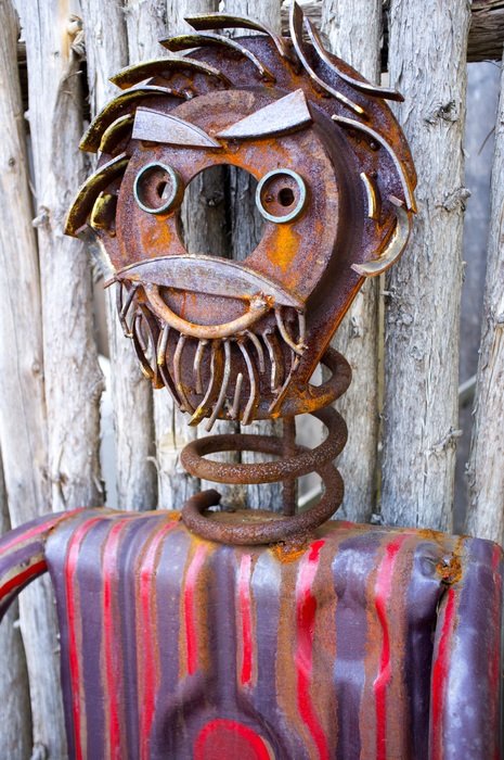 metal figure of a man with a beard