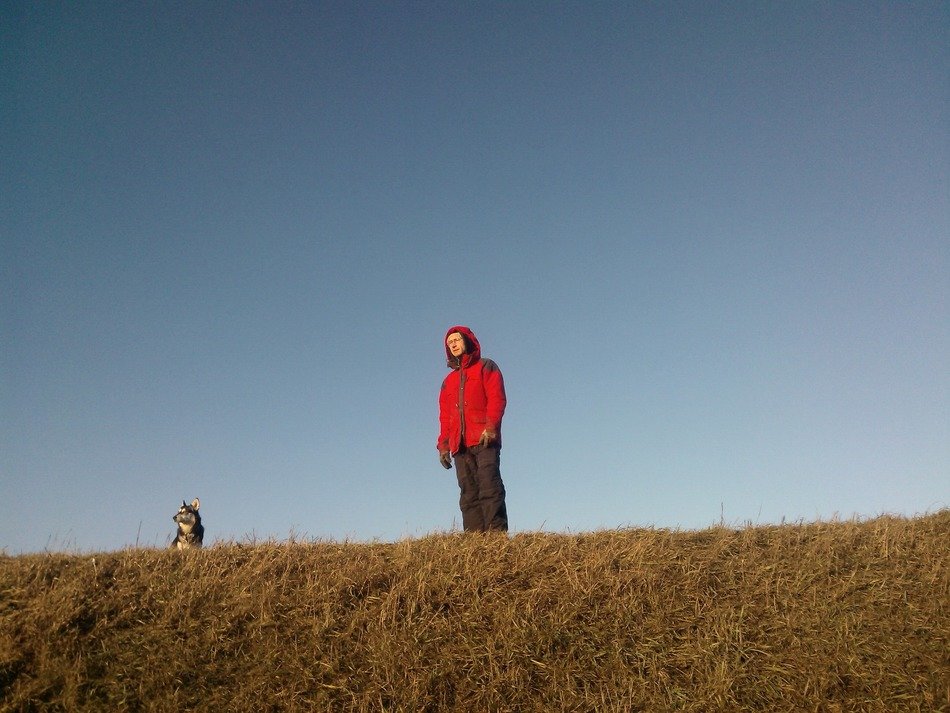 dog and man in red