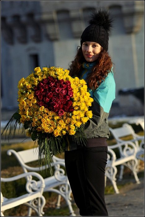 girl with a bouquet in the castle park