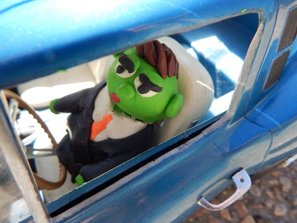 driving car plasticine figurine drawing