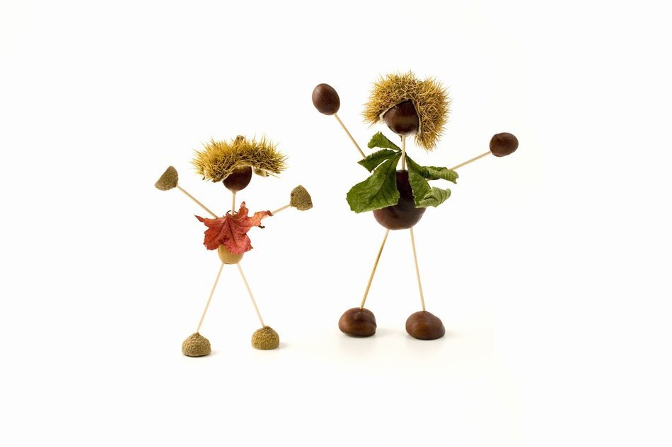 the stick figures of a chestnut and straw