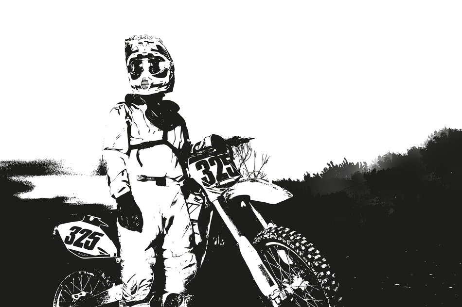 black and white portrait of a motorcycle racer