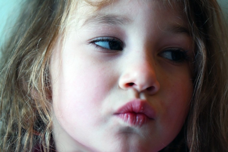 photo of girl with outstretched lips